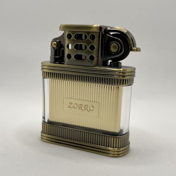 Бензинова Запальничка ZORRO Антична Бронза в прозорому корпусі