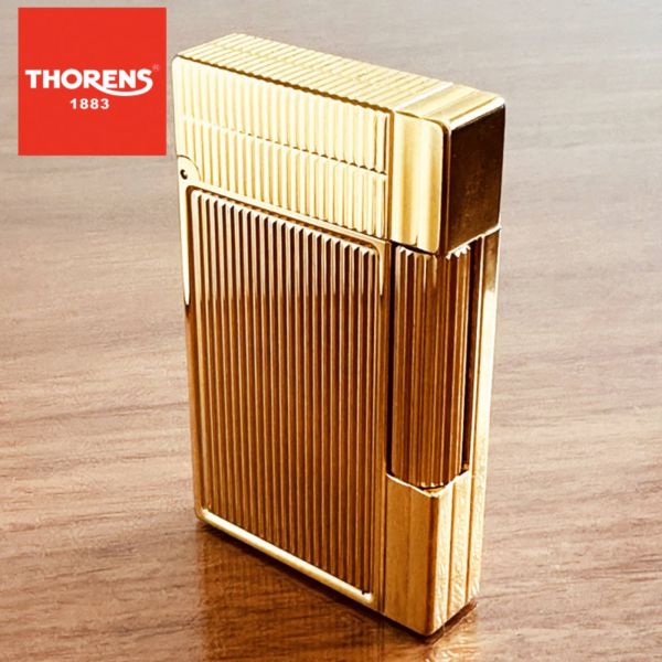 Класична газова запальничкаThorens золотого кольору