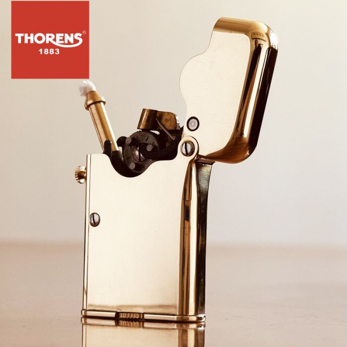 Елегантна бензинова запальничка Thorens золотистого кольору